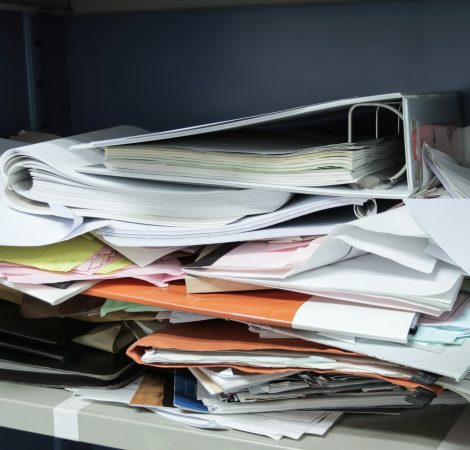 Messy file document and Office Supplies in filing cabinets at work office