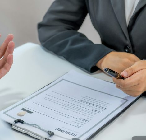 Office executives interviewing job applicants in the meeting room.